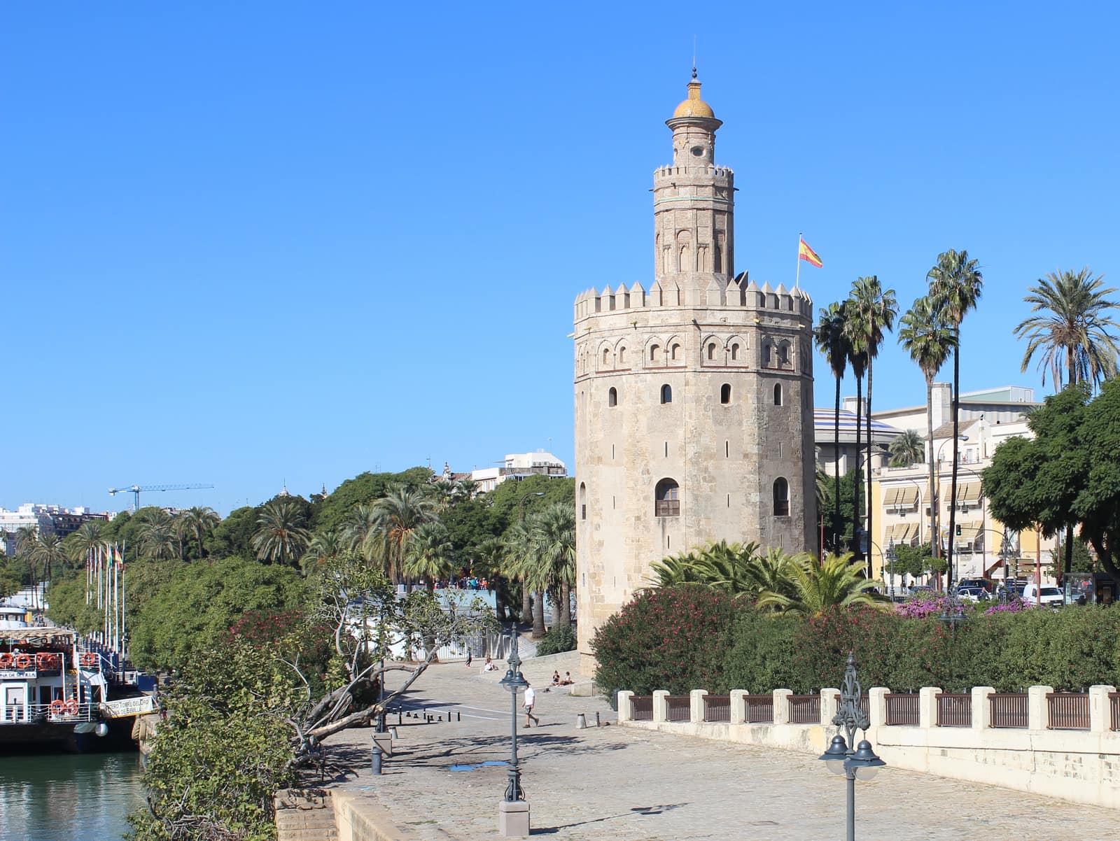 The Guadalquivir at Seville. Cuttings bound for Peru left through this riverine port system, the Carrera de Indias. The photograph records the place now, not a reconstructed sixteenth-century waterfront.